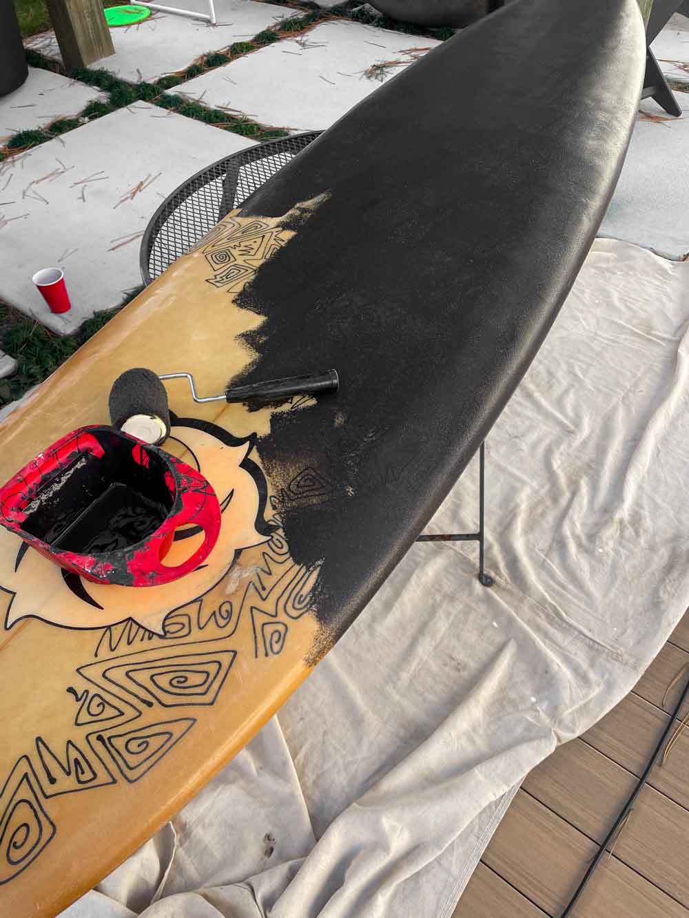 surf board repair by interior designer Patchi Cancado